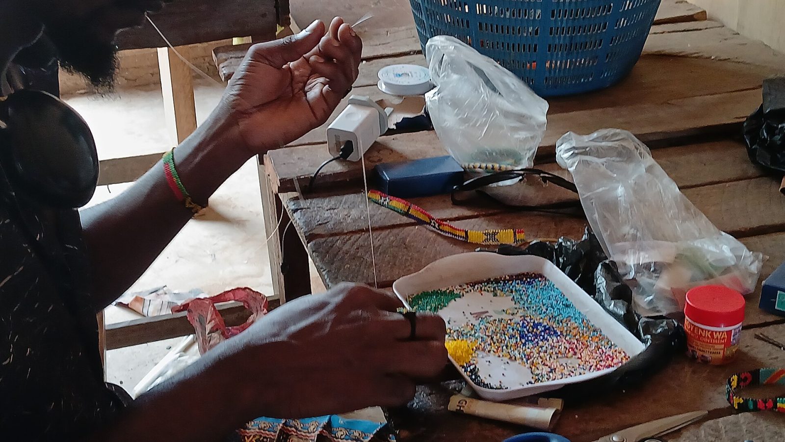 A craftsman making beads at the Centre for National Culture, Accra