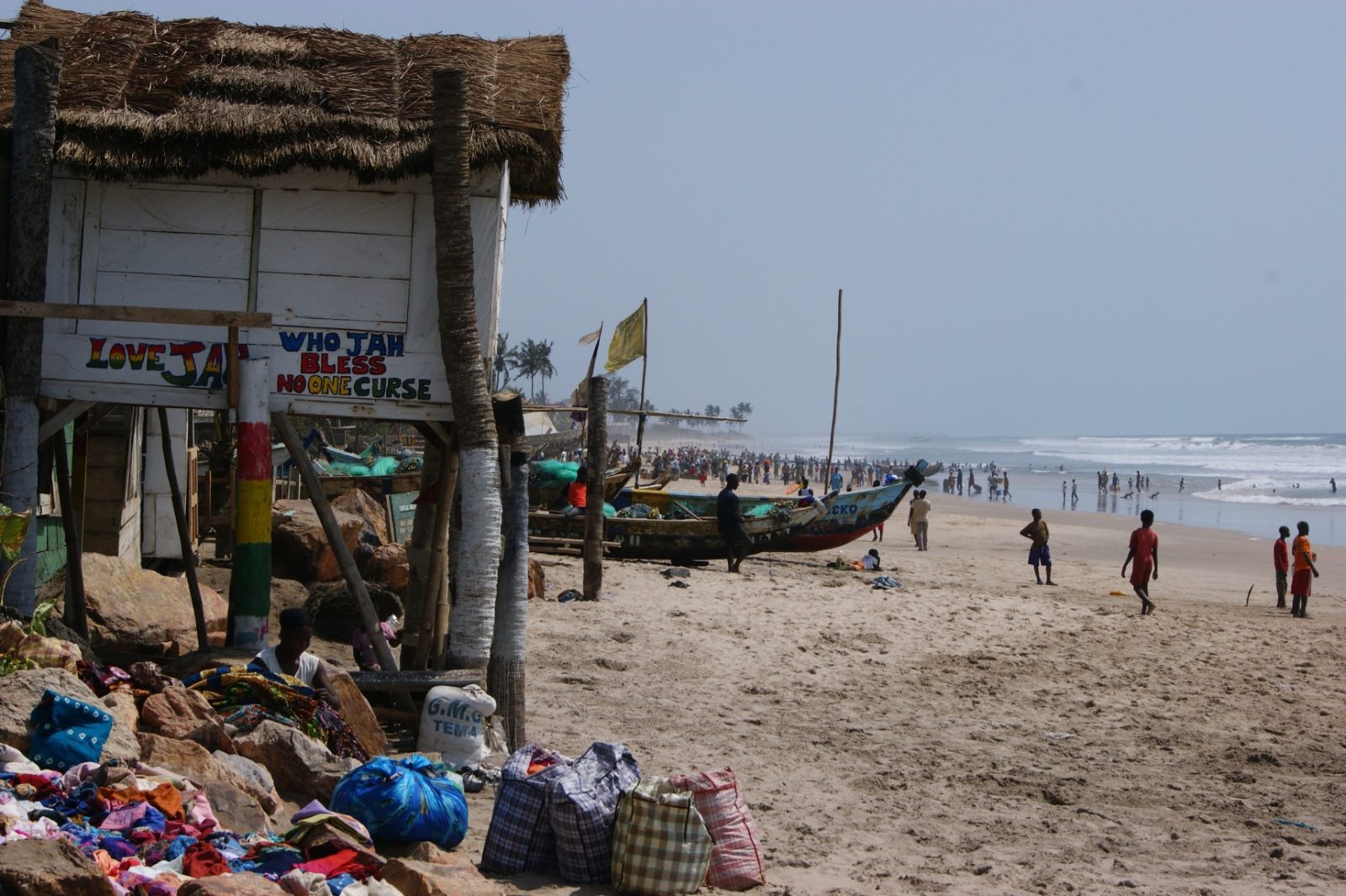 Fishing canoes and beach stalls at Kokrobite