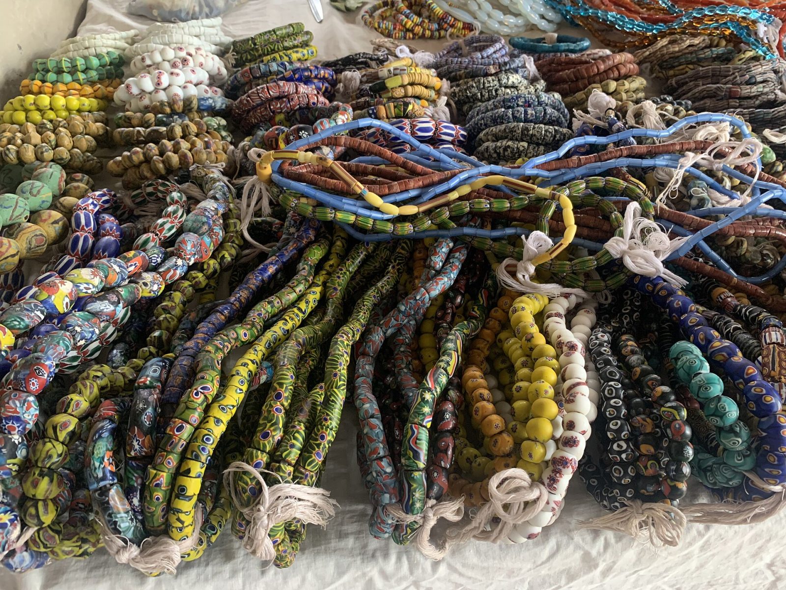 Strings of colourful Krobo glass beads